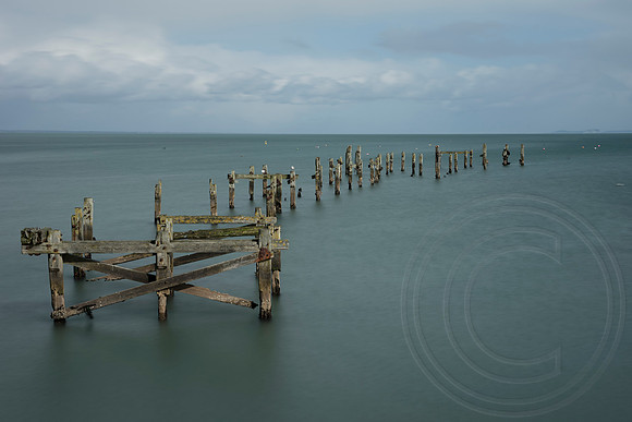 Remains of the old pier in Swanage, Dorset.