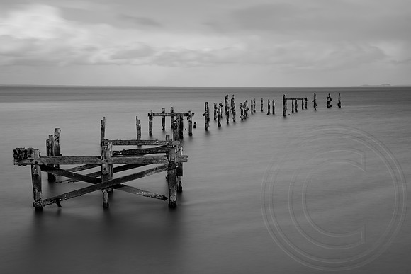 Remains of the old pier in Swanage, Dorset.